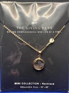 The Giving Keys Gold Round Pendant Necklace with Key Accent